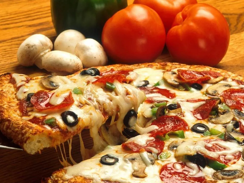 Motivul pentru care este bine sa mananci pizza la micul dejun