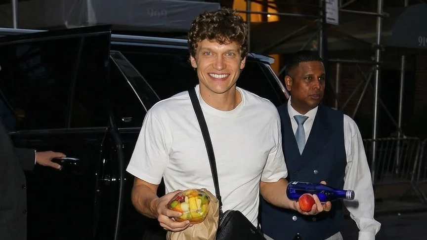 Connor Storrie snacks in style during playful NYC arrival