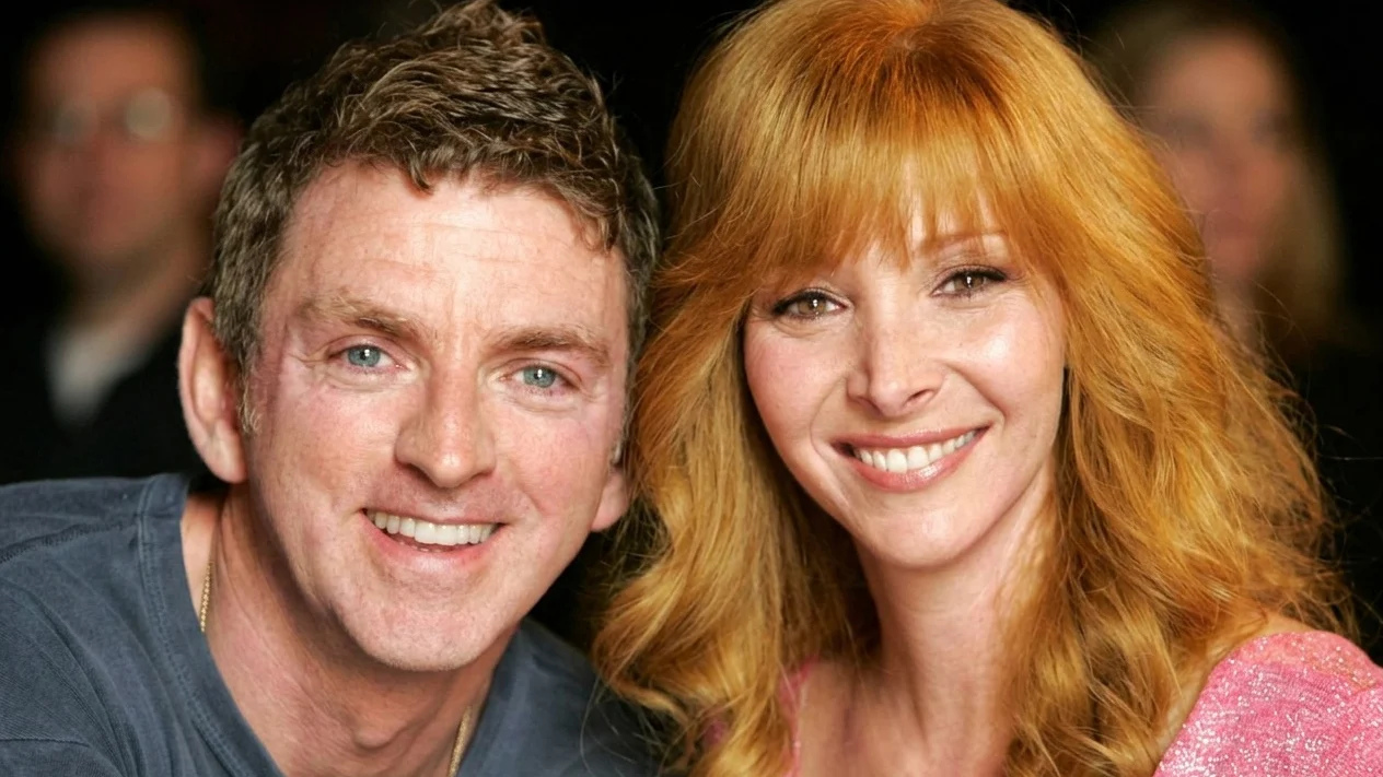 Image may contain Michael Patrick King Shari Lewis Face Head Person Photography Portrait Happy Smile and Blonde