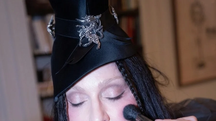 Image may contain Madonna Adult Person Accessories Jewelry Necklace Brush Device Tool and Festival