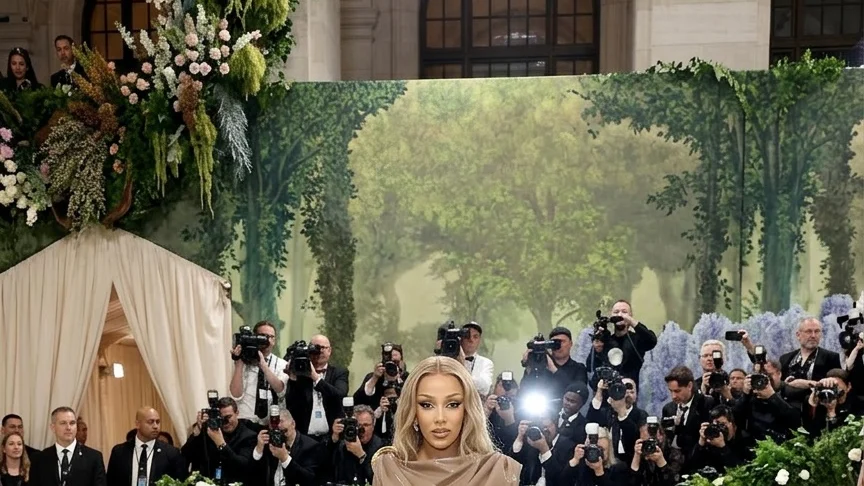 Doja Cat wearing a beige latex dress at the Met Gala