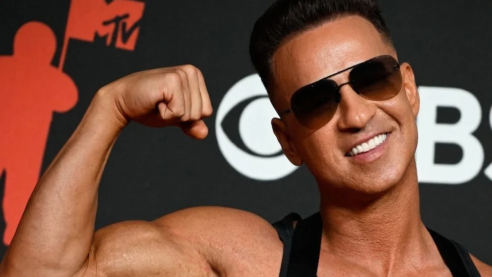 Mike Sorrentino posing on the red carpet.