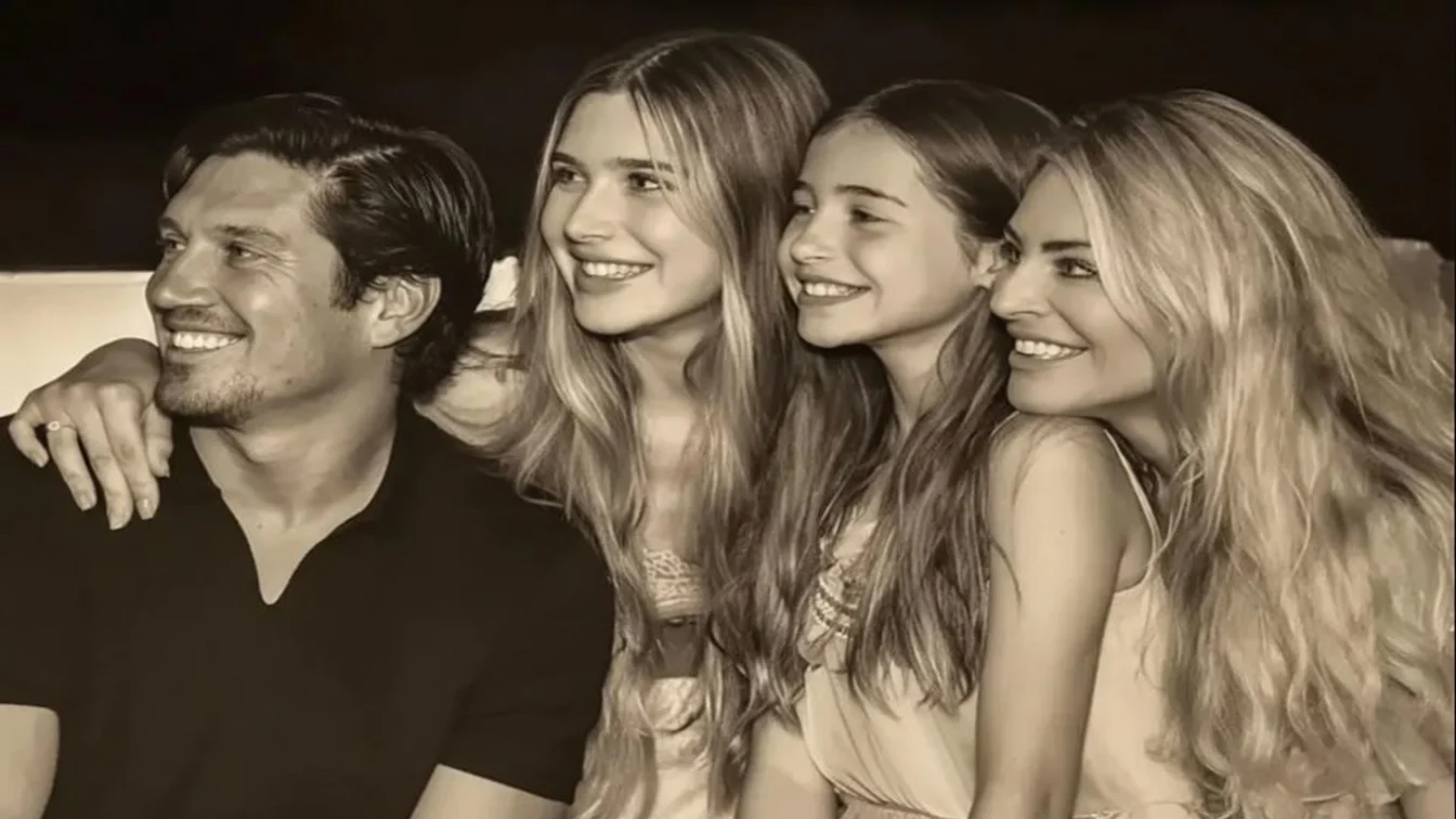 Black-and-white-image of Tess Daly and Vernon Kay with their two daughters