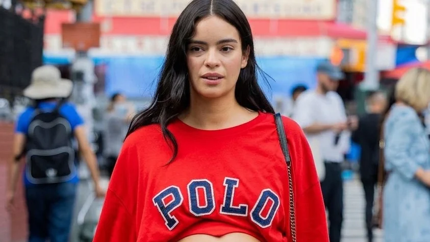 NEW YORK, NEW YORK - SEPTEMBER 12: A pregnant guest wearing cut out red shirt, denim jeans outside Maryam Nassir Zadeh on September 12, 2022 in New York City. (Photo by Christian Vierig/Getty Images)