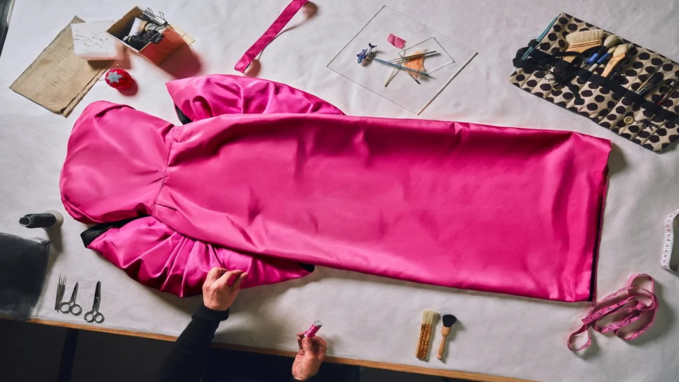 Image may contain Clothing Coat Brush Device Tool Dress and Velvet