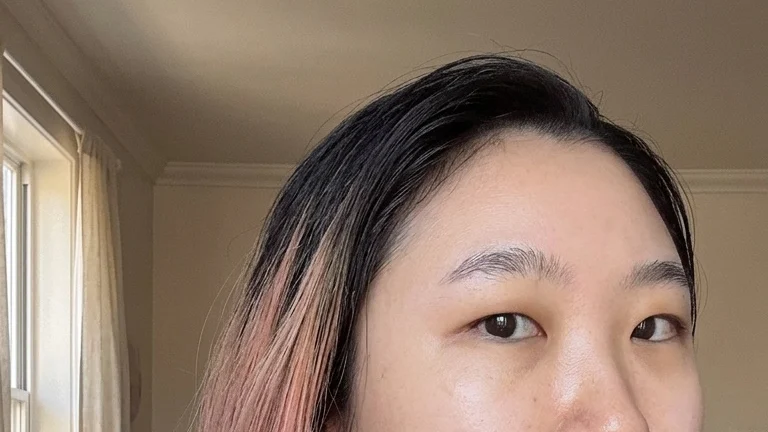 Han after applying the IOPE Expert Vitamin C 25 Antioxidant Serum
