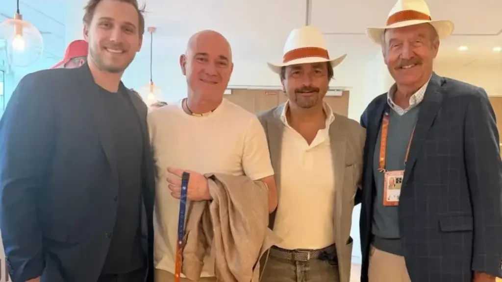 Andre's son towered over him