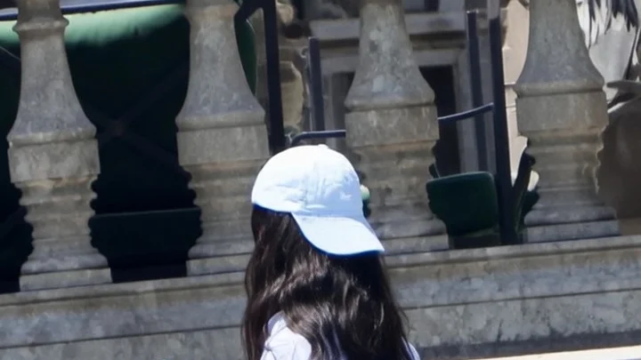 Image may contain Clothing Shorts Accessories Bag Handbag Baseball Cap Cap Hat Person Teen Skirt and Purse