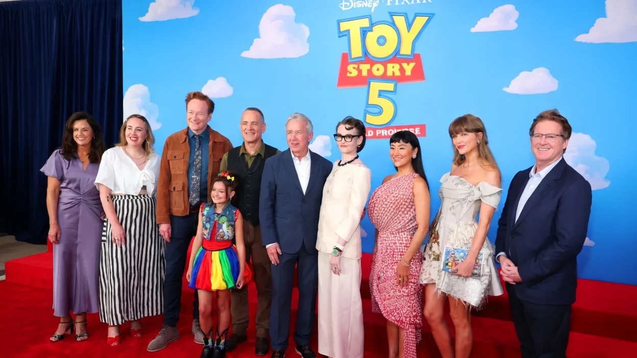 (L-R) Lindsey Collins, Kenna Harris, Conan O'Brien, Scarlett Spears, Tom Hanks, Tim Allen, Joan Cusack, Greta Lee, Taylor Swift and Andrew Stanton attend the Toy Story 5 Los Angeles World Premiere