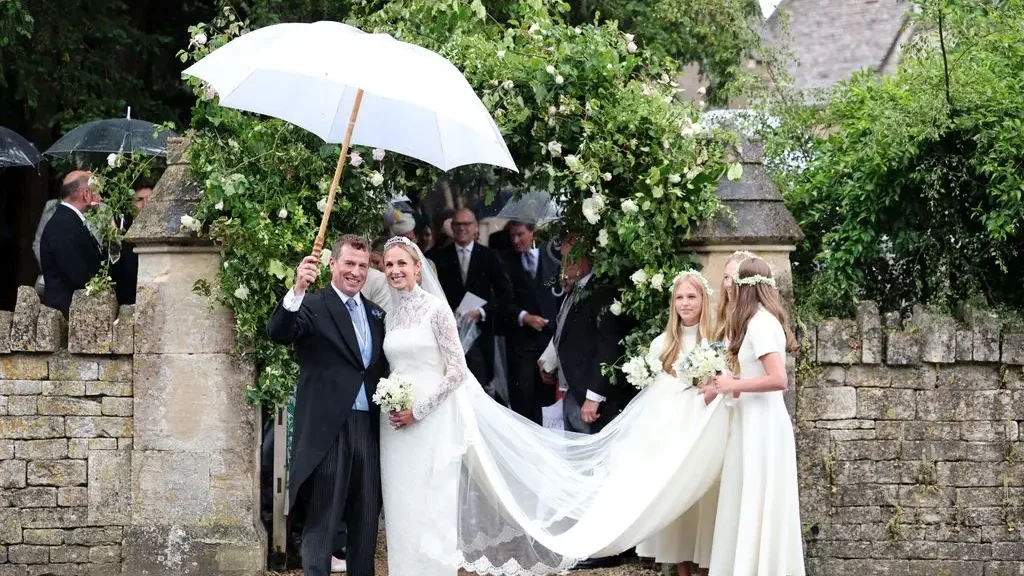 Peter Phillips and Harriet Sperling depart from their Royal wedding alongside bridesmaids Georgina Sperling, Savannah Phillips and Isla Phillips at All Saints' Church